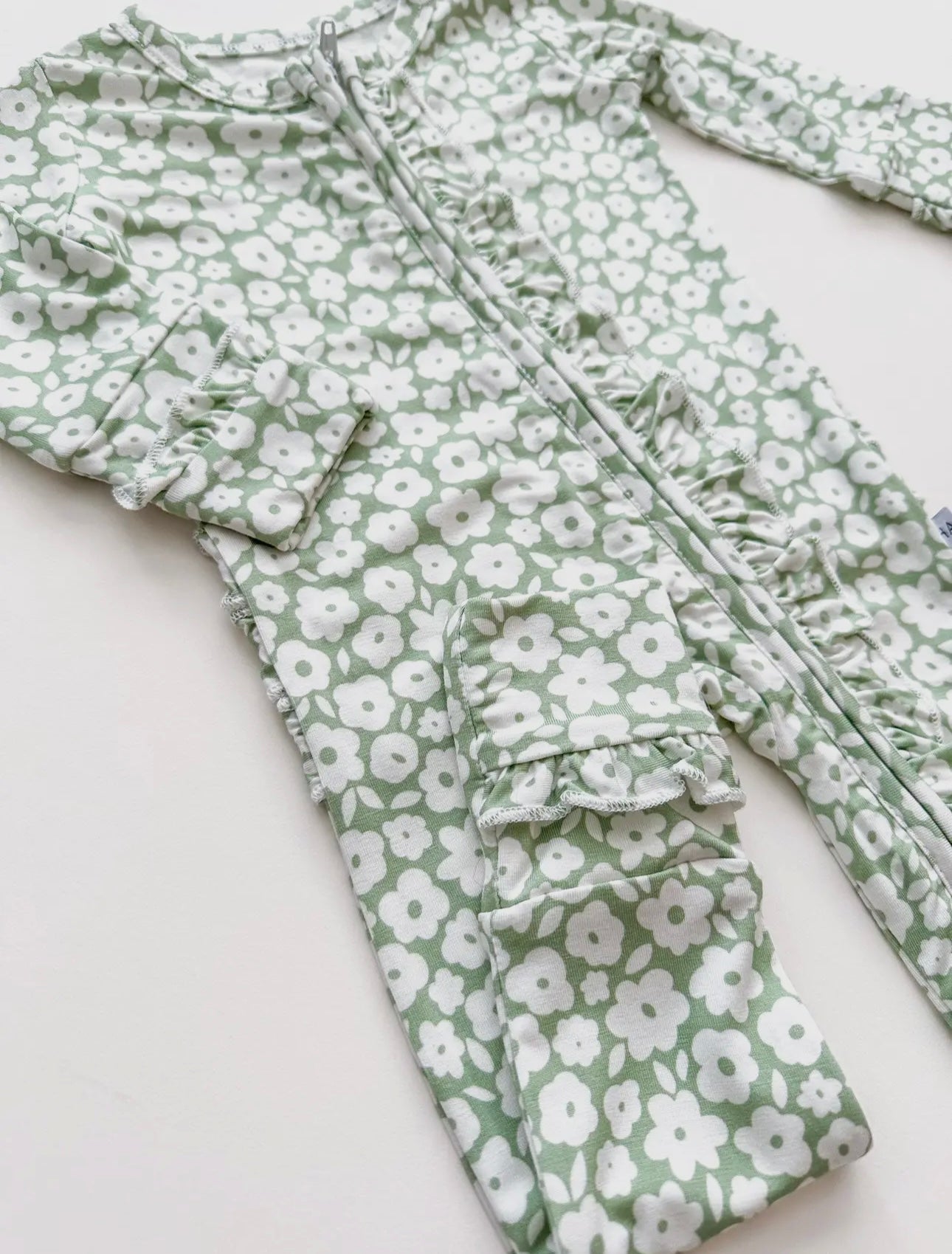 sage floral bamboo ruffle butt footie